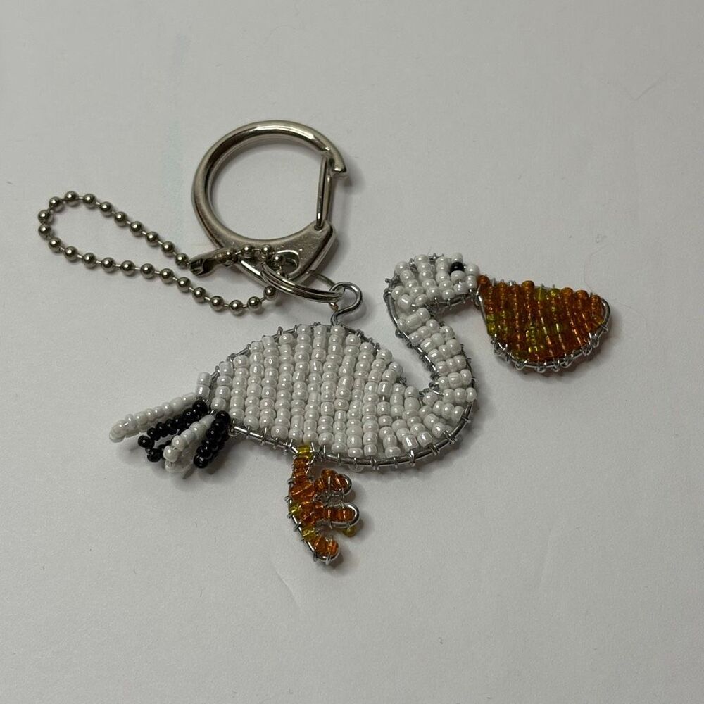 Beaded Pelican Keychain with Black White Orange Beads with Silver Hardware